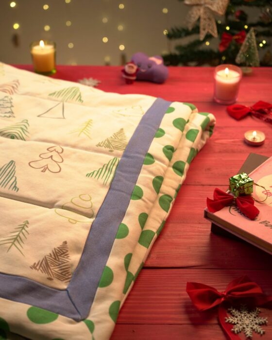 WhatsApp Image 2023-12-20 at 7.13.05 PM(1) Unisex Kids Organic Cotton Winter Quilts with festive Xmas Christmas tree print - Image 1